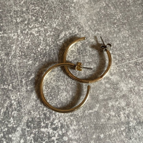 Hoop earrings used, gold-colored