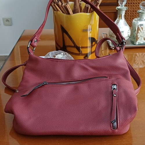 Handbag new, wine color with multiple external pockets