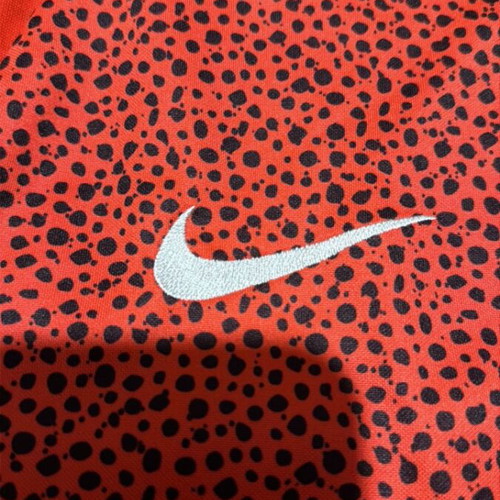Nike sports shirt like new, unisex, black and red