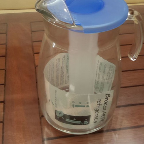 Glass pitcher new with ice compartment