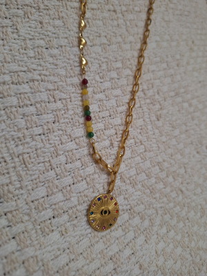 Steel necklace like new, gold color with multicolor details
