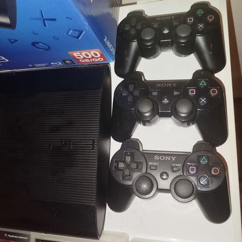 PS3 Super Slim 12GB console with 4 games and 3 controllers