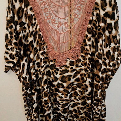 Caftan used with impressive knitted back