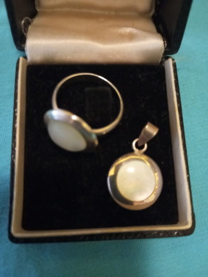 Silver set with natural moonstone like new, pendant and ring size 56