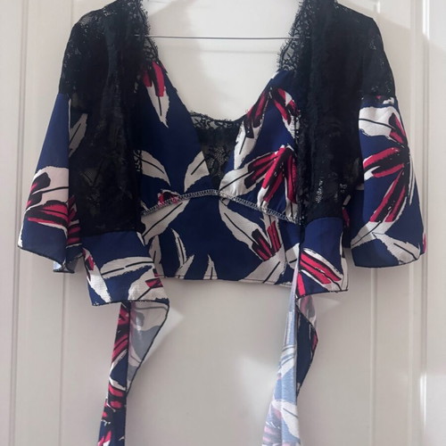 Blue floral top like new, backless with ties