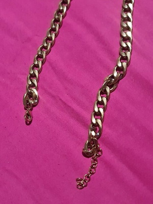 Steel necklace chain like new, gold color, thick weave
