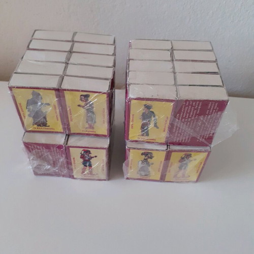 Shadow theater figure matchboxes new, four sealed packs