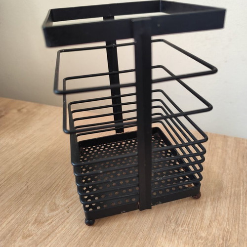 Metal organizer used, black color