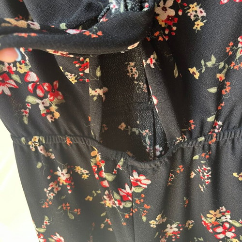 Set of two playsuits rompers like new, black floral and striped Bershka