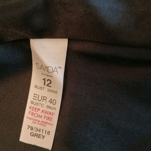 Gray coat with unique design like new
