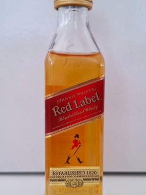 Johnny Walker Red Label collectible miniature sealed plastic bottle