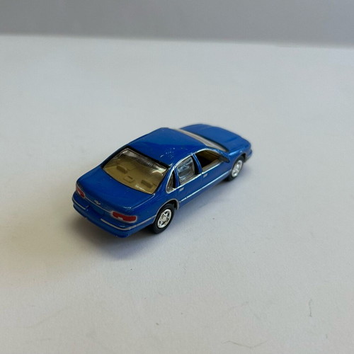 Johnny Lightning 1999 Chevy Caprice 1995 toy car used, very good condition