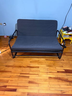 Two-seater folding sofa bed like new
