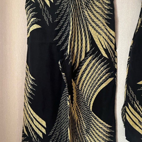 Set palazzo pants and asymmetric top used, size S-M