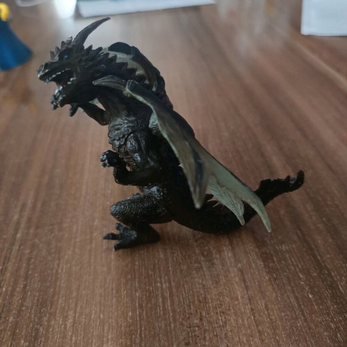 Dragon used, 11cm tall, missing finger on right hand