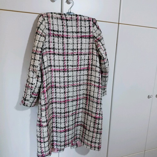Coat used, no collar, fastens with studs, size M, white multicolor