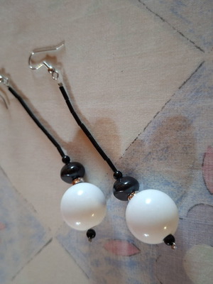 Long black and white hanging earrings like new with metal details