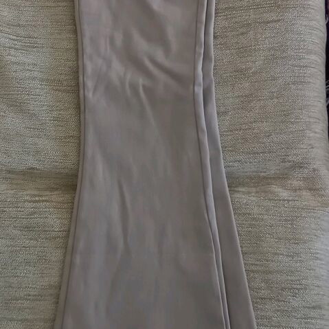 Beige bell-bottom pants new with belt, size XS