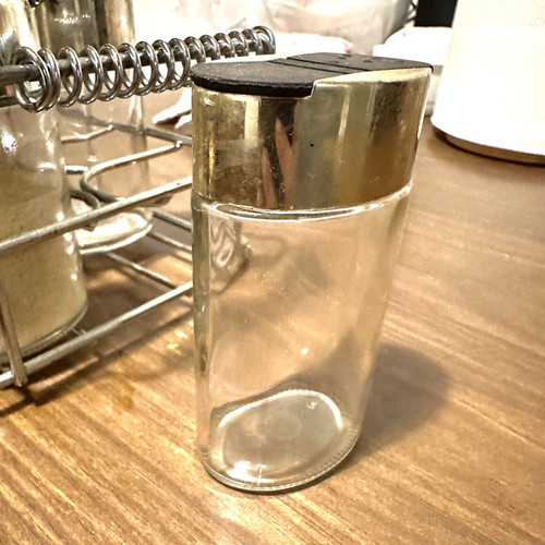 Vintage spice set with metal rack and 8 glass jars used