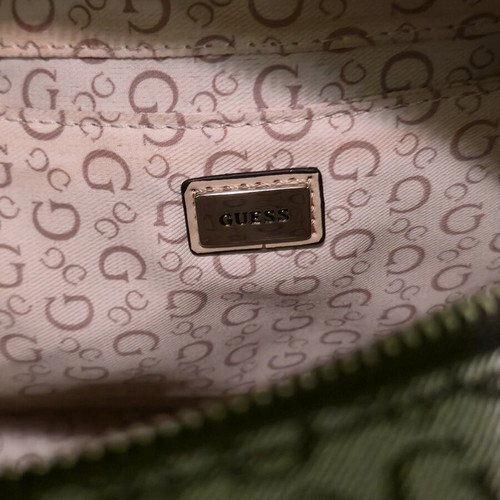 Guess women's backpack like new with gift pouch, black and gray