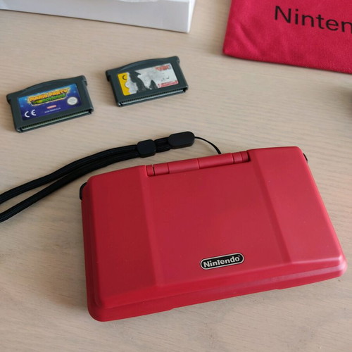 Nintendo DS (2004) console used with 2 games, charger, and accessories