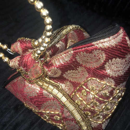 Red gold Indian brocade potli bag like new with bracelet gift