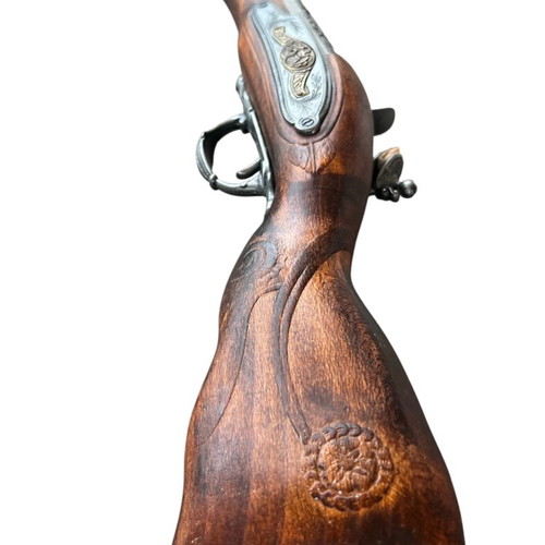 Decorative blunderbuss flintlock pistol used with wooden stock