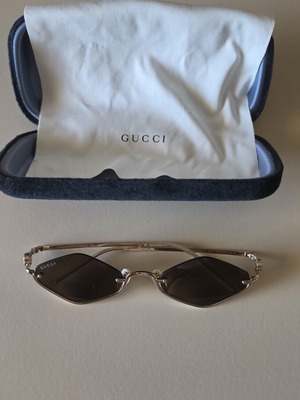 Gucci sunglasses, brown and gold