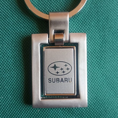 Vintage Subaru spinning keychain New Old Stock NOS heavy metal 37.45g