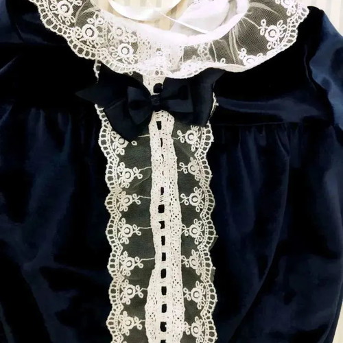 Caramelo kids romper used for 6-9 months with white embroidered details
