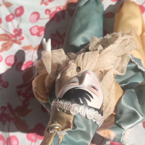 Vintage porcelain Harlequin doll used