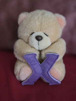 Hallmark Forever Friends teddy bear holding purple letter X