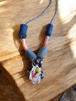 Handmade necklace with silicone cord, beads and denim flower