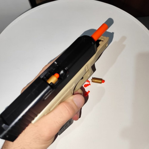 G26 9x19 Semi-Automatic Toy Pistol new with 6 shells and 20 plastic bullets