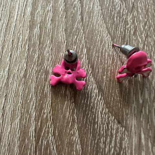 Vintage skull and crossbones stud earrings, bright pink with rhinestone