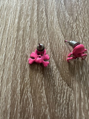 Vintage skull and crossbones stud earrings, bright pink with rhinestone
