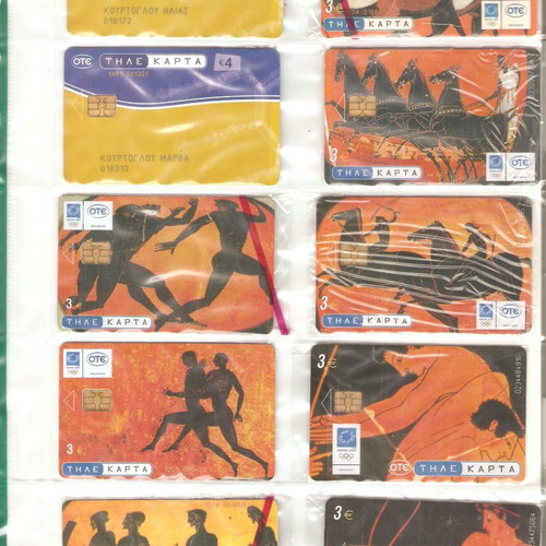 Collection of used 2307 phone cards with holders