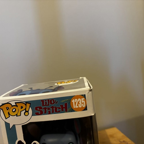 Funko Pop Luka Doncic and Stitch figures