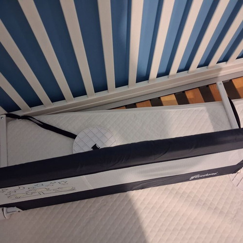 Baby cot with rails, like new, includes mattress and protector
