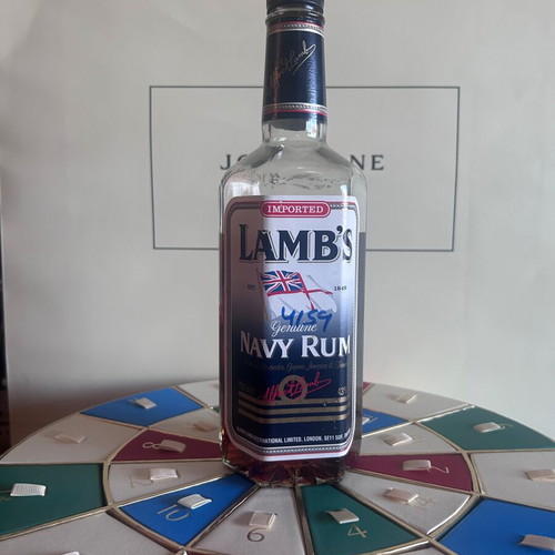 Lamb’s Navy Rum like new with hexagonal bottle