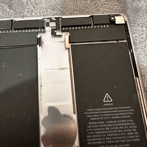 iPad Pro back cover with spare parts and battery
