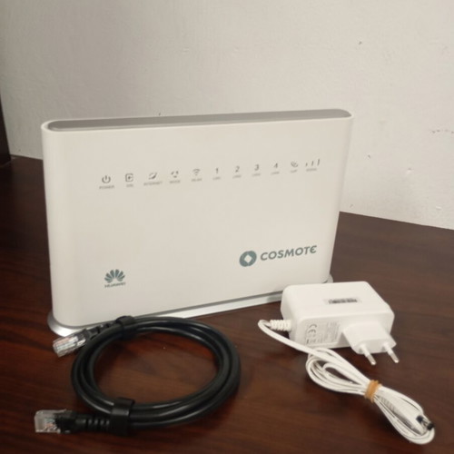 Cosmote hybrid access point with SIM card port
