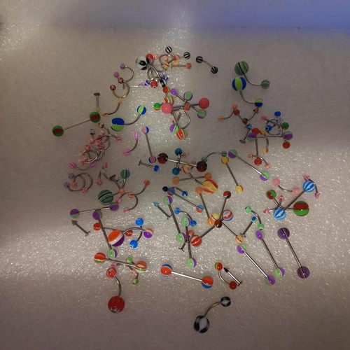 Piercing earrings set like new, 100 pieces, various designs and colors