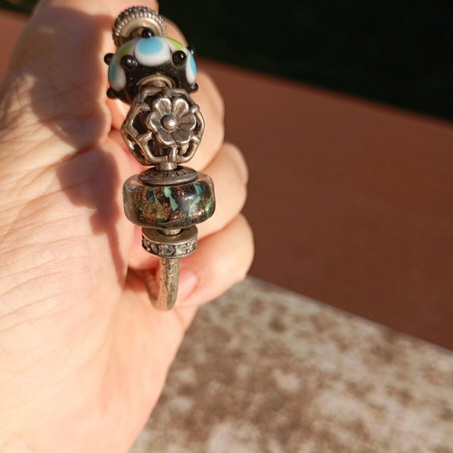 Hammered silver bracelet with Murano charms like new
