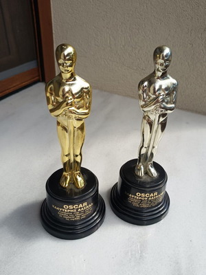 Plastic Oscar awards like new, silver and gold set of 2