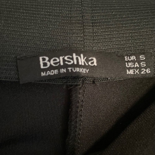 Bershka black pants with studs used, size small