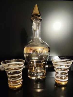 Vintage glass decanter set with 2 glasses used, gold decorations