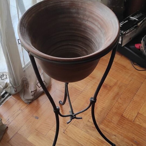 Ceramic vase used on metal tripod stand height 70 cm