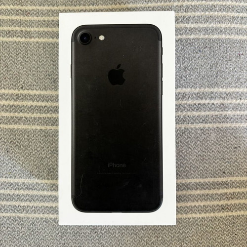 iPhone 7 with 5 cases and 3 screen protectors
