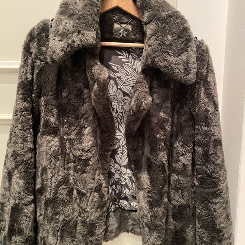 Faux fur gray small like new with design on sleeve and shoulders